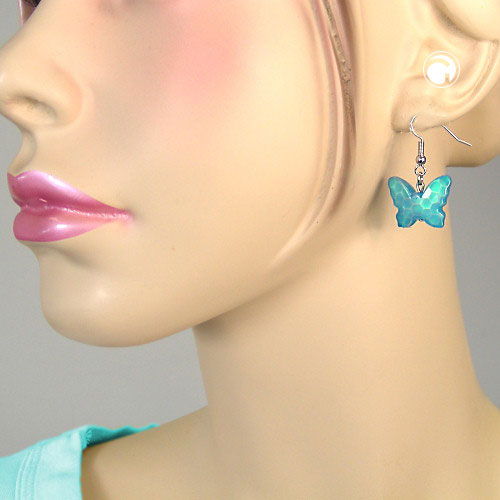 Ear hook earrings 32x16mm butterfly with cut plastic pearl turquoise blue
