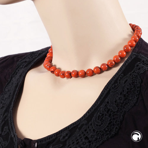 Kette 10mm Rundperle orange-schwarz-marmoriert Kunststoff