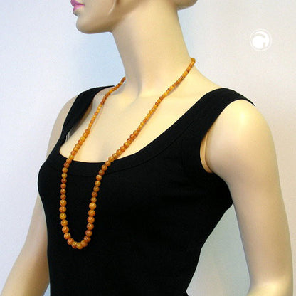 Chain 6-8-10mm pearls amber-colored shiny plastic 90cm