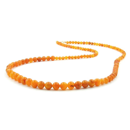 Chain 6-8-10mm pearls amber-colored shiny plastic 90cm