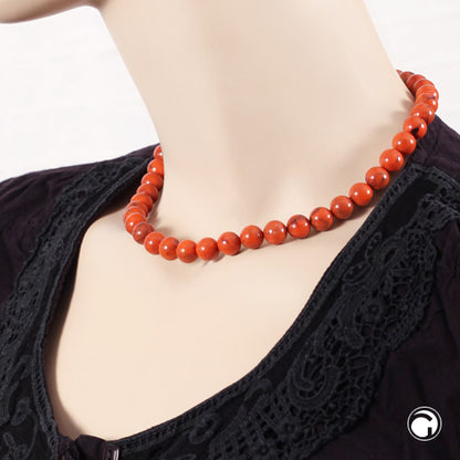 Kette 10mm Rundperle orange-schwarz-marmoriert Kunststoff