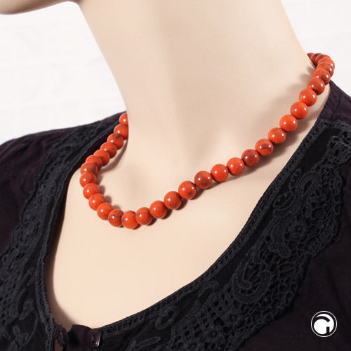 Kette 10mm Rundperle orange-schwarz-marmoriert Kunststoff