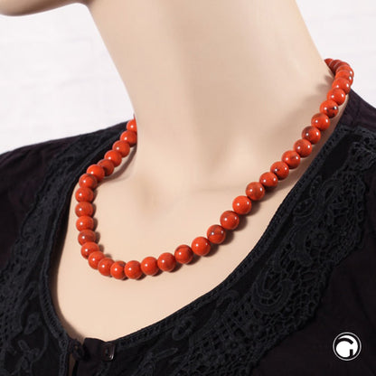 Kette 10mm Rundperle orange-schwarz-marmoriert Kunststoff
